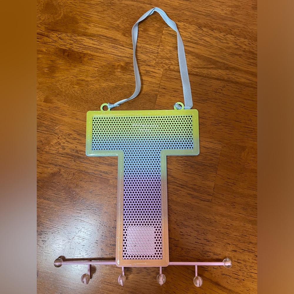 “T” wall plaque
